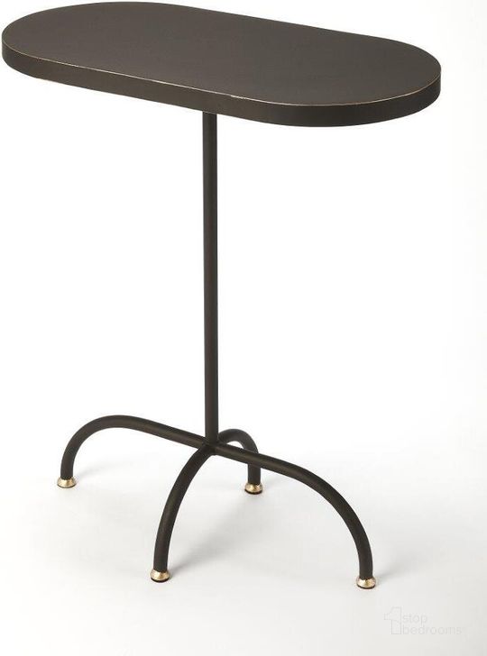 The appearance of Butler Cleo Black Gold End Table designed by Butler Specialty Company in the modern / contemporary interior design. This black piece of furniture  was selected by 1StopBedrooms from Metalworks Collection to add a touch of cosiness and style into your home. Sku: 5313387. Product Type: End Table. Material: Iron. Image1