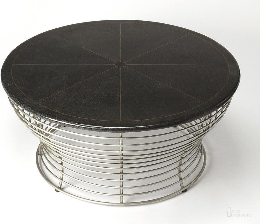 The appearance of Butler Fleming Fossil Stone and Metal Coffee Table designed by Butler Specialty Company in the modern / contemporary interior design. This black piece of furniture  was selected by 1StopBedrooms from Fleming Collection to add a touch of cosiness and style into your home. Sku: 5274025. Product Type: Coffee Table. Material: Plywood. Image1