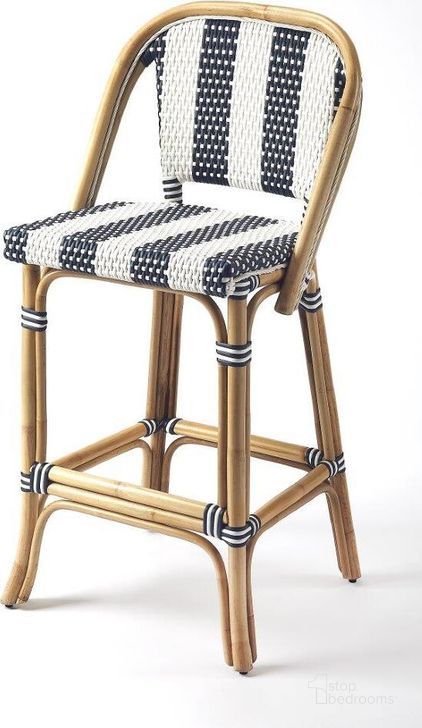 The appearance of Butler Lila Blue and White Stripe Rattan Bar Stool designed by Butler Specialty Company in the transitional interior design. This blue piece of furniture  was selected by 1StopBedrooms from Designer's Edge Collection to add a touch of cosiness and style into your home. Sku: 3715291. Material: Rattan. Product Type: Barstool. Image1