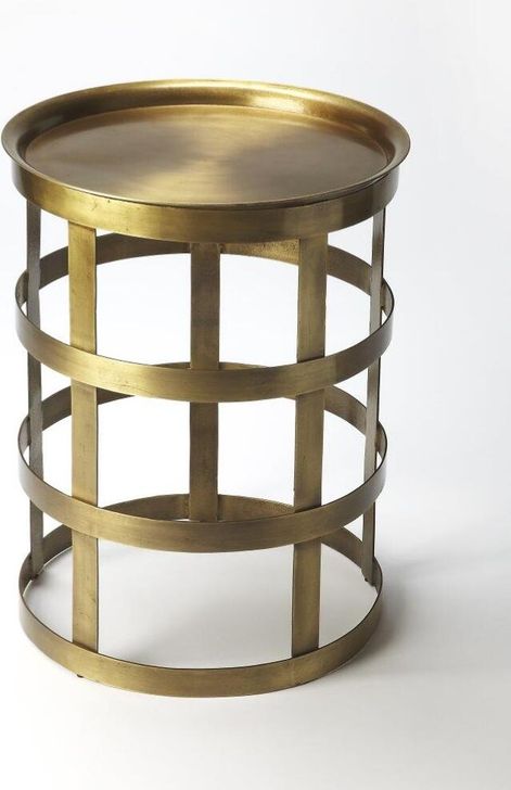 The appearance of Butler Regis Industrial Chic Accent Table designed by Butler Specialty Company in the modern / contemporary interior design. This gold piece of furniture  was selected by 1StopBedrooms from Industrial Chic Collection to add a touch of cosiness and style into your home. Sku: 6118330. Product Type: Accent Table. Material: Iron.
