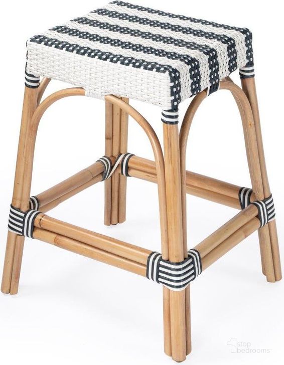 The appearance of Butler Robias Navy and White Rattan Counter Stool designed by Butler Specialty Company in the transitional interior design. This navy piece of furniture  was selected by 1StopBedrooms from Robias Collection to add a touch of cosiness and style into your home. Sku: 5513372. Material: Rattan. Product Type: Barstool. Image1