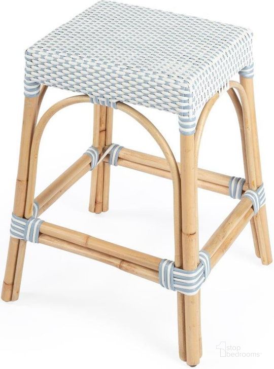 The appearance of Butler Robias Twilight Blue and White Rattan Counter Stool designed by Butler Specialty Company in the transitional interior design. This blue and white piece of furniture  was selected by 1StopBedrooms from Designer's Edge Collection to add a touch of cosiness and style into your home. Sku: 5513194. Material: Rattan. Product Type: Barstool. Image1