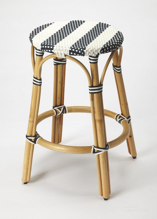 The appearance of Butler Tobias Blue and White Rattan Counter Stool 9371291 designed by Butler Specialty Company in the transitional interior design. This blue and white piece of furniture  was selected by 1StopBedrooms from Designer's Edge Collection to add a touch of cosiness and style into your home. Sku: 9371291. Material: Rattan. Product Type: Barstool. Image1