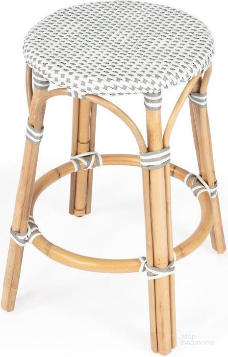 The appearance of Butler Tobias Grey and White Rattan Counter Stool 9371329 designed by Butler Specialty Company in the transitional interior design. This white and grey piece of furniture  was selected by 1StopBedrooms from Designer's Edge Collection to add a touch of cosiness and style into your home. Sku: 9371329. Material: Rattan. Product Type: Barstool. Image1