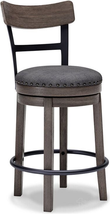 The appearance of Caitbrook Gray Upholstered Swivel Barstool designed by Signature Design by Ashley in the transitional interior design. This gray piece of furniture  was selected by 1StopBedrooms from Caitbrook Collection to add a touch of cosiness and style into your home. Sku: D388-224. Material: Fabric. Product Type: Barstool. Image1