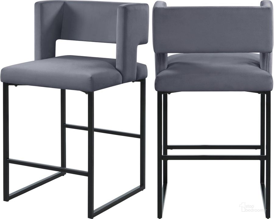 The appearance of Caleb Grey Velvet Counter Stool 970Grey-C Set of 2 designed by Meridian in the modern / contemporary interior design. This grey velvet piece of furniture  was selected by 1StopBedrooms from Caleb Collection to add a touch of cosiness and style into your home. Sku: 970Grey-C. Product Type: Barstool. Material: Velvet. Image1