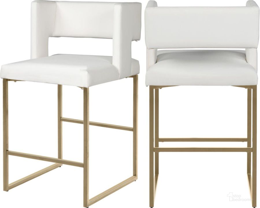 The appearance of Caleb White Faux Leather Counter Stool 969White-C Set of 2 designed by Meridian in the modern / contemporary interior design. This white piece of furniture  was selected by 1StopBedrooms from Caleb Collection to add a touch of cosiness and style into your home. Sku: 969White-C. Material: Faux Leather. Product Type: Barstool. Image1