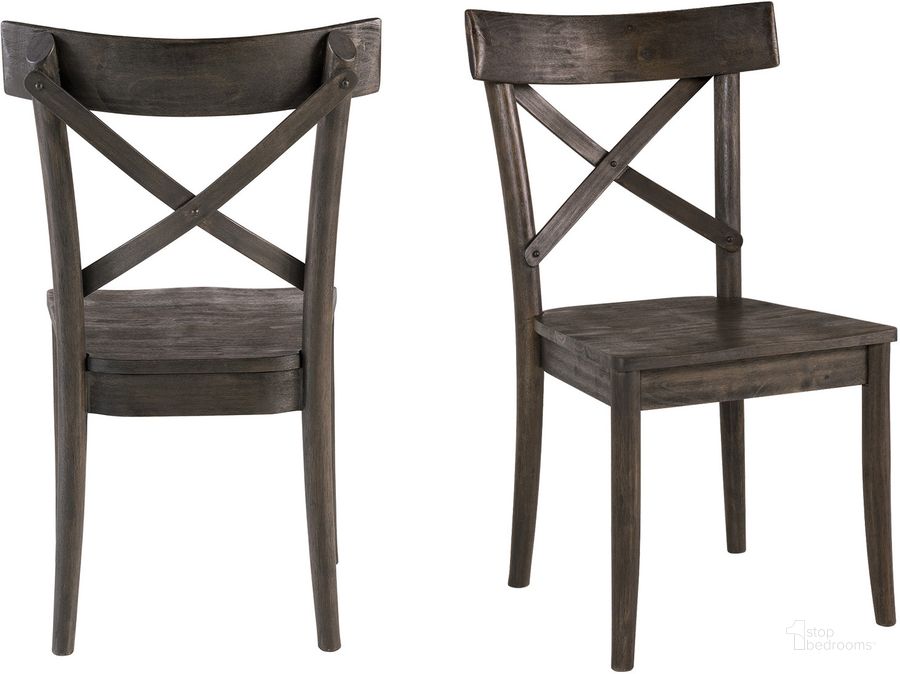 The appearance of Calhoun Dark Brown Wooden Side Chair Set Of 2 designed by Picket House in the transitional interior design. This brown piece of furniture  was selected by 1StopBedrooms from Calhoun Collection to add a touch of cosiness and style into your home. Sku: LCO100WSC. Material: Wood. Product Type: Side Chair. Image1