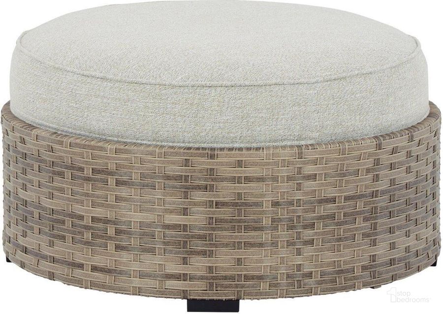 The appearance of Calworth Beige Outdoor Ottoman designed by Signature Design by Ashley in the modern / contemporary interior design. This beige piece of furniture  was selected by 1StopBedrooms from Calworth Collection to add a touch of cosiness and style into your home. Sku: P458-814. Product Type: Outdoor Ottoman. Image1