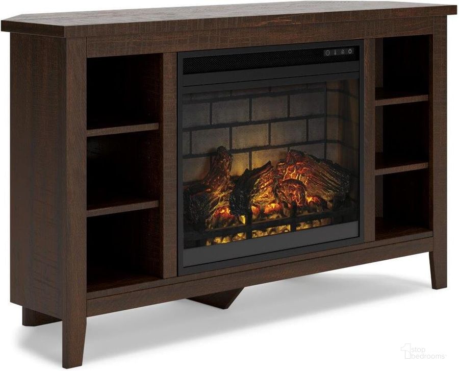 The appearance of Camiburg Warm Brown Corner TV Stand With Infrared Electric Fireplace designed by Signature Design by Ashley in the transitional interior design. This warm brown piece of furniture  was selected by 1StopBedrooms from Camiburg Collection to add a touch of cosiness and style into your home. Sku: W283-67;W100-101. Material: Wood. Product Type: TV Stand. Image1