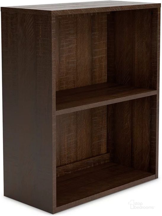 The appearance of Camiburg Warm Brown Small Bookcase designed by Signature Design by Ashley in the transitional interior design. This warm brown piece of furniture  was selected by 1StopBedrooms from Camiburg Collection to add a touch of cosiness and style into your home. Sku: H283-15. Material: Wood. Product Type: Bookcase. Image1