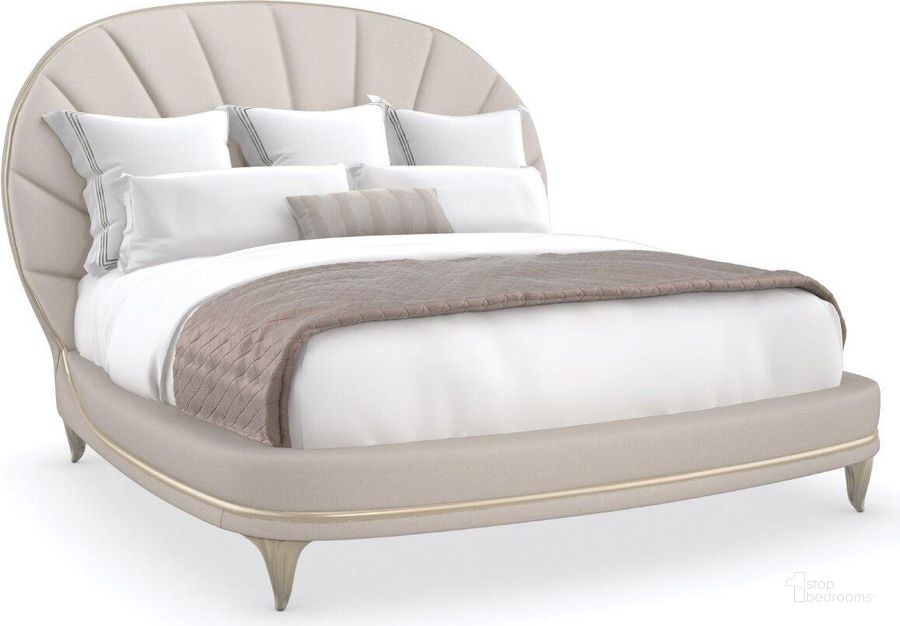 The appearance of Caracole Compositions Lillian Upholstered Bed King designed by Caracole in the transitional interior design. This radiance piece of furniture  was selected by 1StopBedrooms from Lillian Collection to add a touch of cosiness and style into your home. Sku: C093-020-121. Bed Type: Panel Bed. Material: Wood. Product Type: Panel Bed. Bed Size: King. Image1
