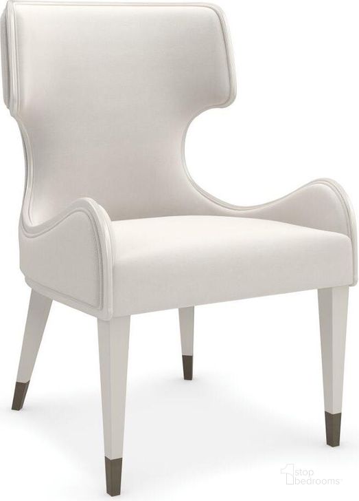The appearance of Caracole Compositions Valentina Upholstered Arm Chair designed by Caracole in the transitional interior design. This pearl piece of furniture  was selected by 1StopBedrooms from Valentina Collection to add a touch of cosiness and style into your home. Sku: C112-422-271. Material: Wood. Product Type: Dining Chair. Image1