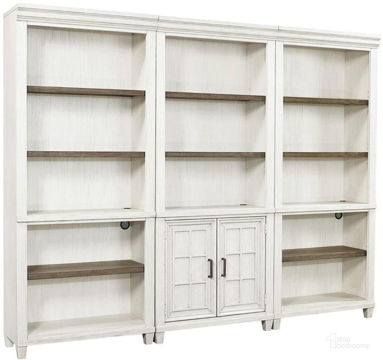 The appearance of Caraway Bookcase Wall In White designed by Aspenhome in the country / farmhouse interior design. This white piece of furniture  was selected by 1StopBedrooms from Caraway Collection to add a touch of cosiness and style into your home. Sku: I248-333-1;I248-333-1;I248-332-1. Material: Wood. Product Type: Bookcase. Image1