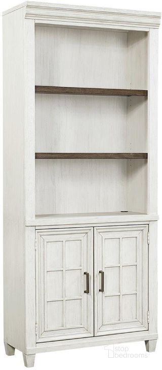The appearance of Caraway Door Bookcase In White designed by Aspenhome in the country / farmhouse interior design. This white piece of furniture  was selected by 1StopBedrooms from Caraway Collection to add a touch of cosiness and style into your home. Sku: I248-332-1. Material: Wood. Product Type: Bookcase. Image1