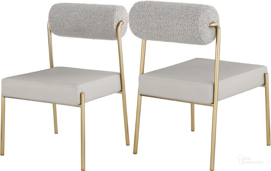 The appearance of Carly Taupe Faux Leather Seat/Boucle Fabric Back Dining Chair Set Of 2 designed by Meridian in the modern / contemporary interior design. This taupe piece of furniture  was selected by 1StopBedrooms from Carly Collection to add a touch of cosiness and style into your home. Sku: 586Taupe-C. Material: Fabric. Product Type: Dining Chair. Image1