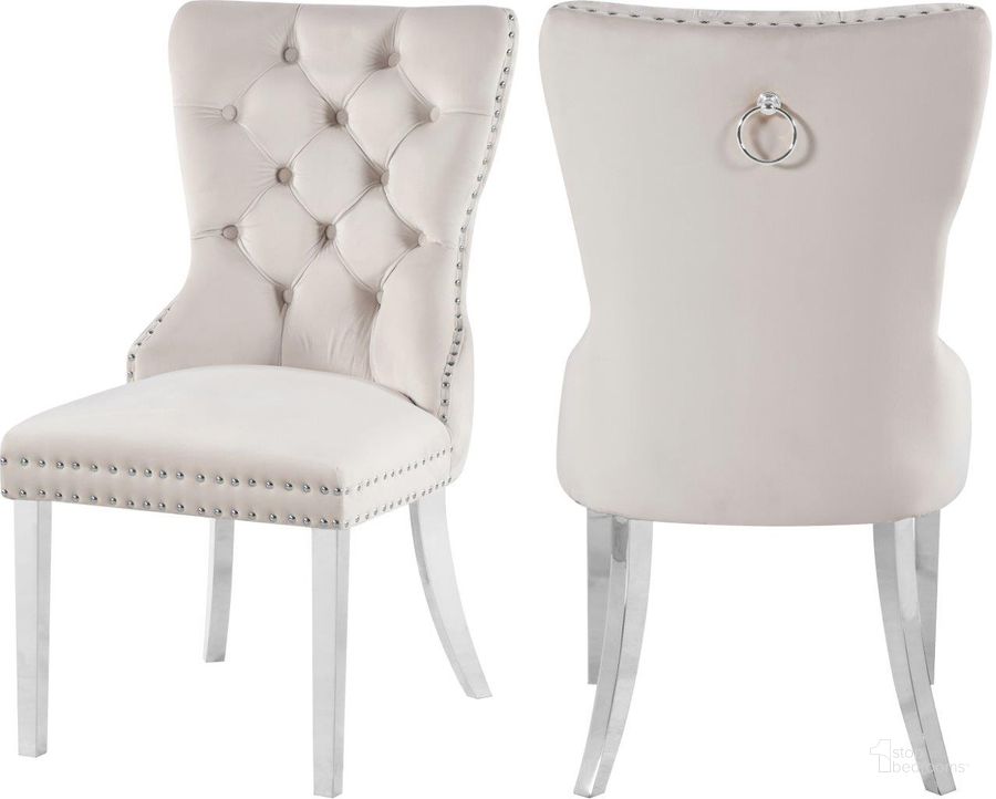 The appearance of Carmen Cream Velvet Dining Chair Set Of 2 designed by Meridian in the modern / contemporary interior design. This cream velvet piece of furniture  was selected by 1StopBedrooms from Carmen Collection to add a touch of cosiness and style into your home. Sku: 743Cream-C. Product Type: Dining Chair. Material: Velvet. Image1