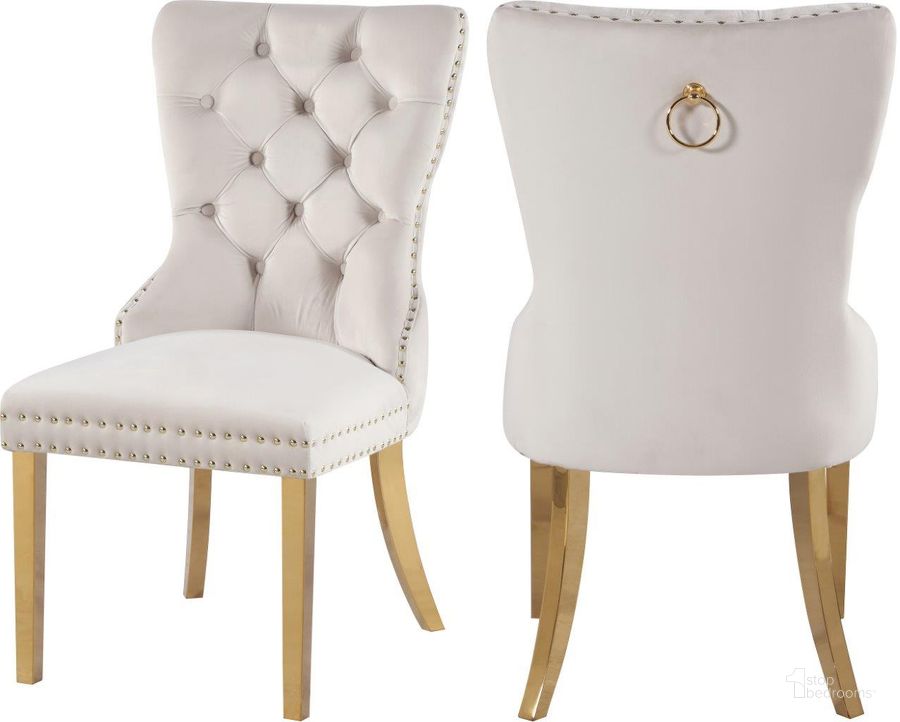 The appearance of Carmen Cream Velvet Dining Chairs Set Of 2 designed by Meridian in the modern / contemporary interior design. This cream velvet piece of furniture  was selected by 1StopBedrooms from Carmen Collection to add a touch of cosiness and style into your home. Sku: 812Cream-C. Product Type: Dining Chair. Material: Velvet. Image1