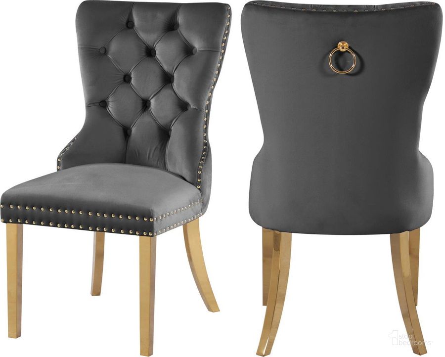 The appearance of Carmen Grey Velvet Dining Chairs Set Of 2 designed by Meridian in the modern / contemporary interior design. This grey velvet piece of furniture  was selected by 1StopBedrooms from Carmen Collection to add a touch of cosiness and style into your home. Sku: 812Grey-C. Product Type: Dining Chair. Material: Velvet. Image1