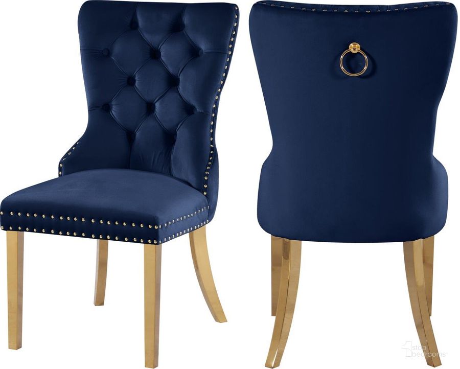 The appearance of Carmen Navy Velvet Dining Chairs Set Of 2 designed by Meridian in the modern / contemporary interior design. This navy velvet piece of furniture  was selected by 1StopBedrooms from Carmen Collection to add a touch of cosiness and style into your home. Sku: 812Navy-C. Product Type: Dining Chair. Material: Velvet. Image1