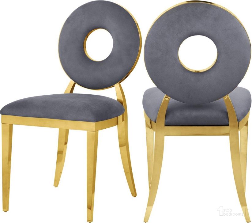 The appearance of Carousel Grey Velvet Dining Chair 858Grey-C Set of 2 designed by Meridian in the modern / contemporary interior design. This grey velvet piece of furniture  was selected by 1StopBedrooms from Carousel Collection to add a touch of cosiness and style into your home. Sku: 858Grey-C. Material: Steel. Product Type: Dining Chair. Image1