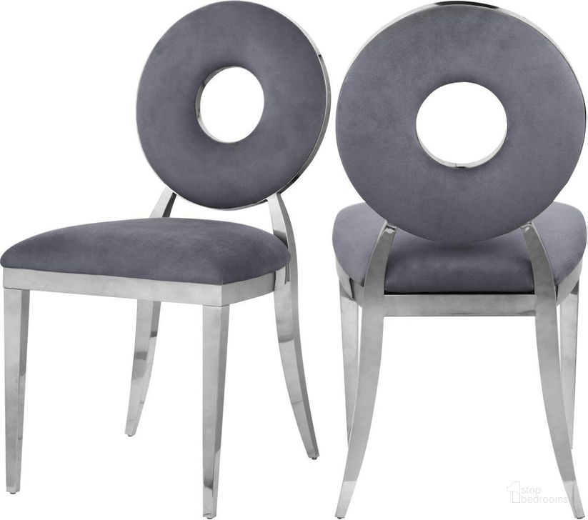 The appearance of Carousel Grey Velvet Dining Chair 859Grey-C Set of 2 designed by Meridian in the modern / contemporary interior design. This grey velvet piece of furniture  was selected by 1StopBedrooms from Carousel Collection to add a touch of cosiness and style into your home. Sku: 859Grey-C. Material: Steel. Product Type: Dining Chair. Image1