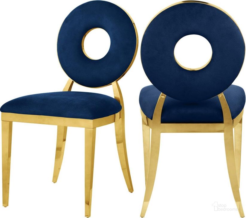 The appearance of Carousel Navy Velvet Dining Chair 858Navy-C Set of 2 designed by Meridian in the modern / contemporary interior design. This navy velvet piece of furniture  was selected by 1StopBedrooms from Carousel Collection to add a touch of cosiness and style into your home. Sku: 858Navy-C. Material: Steel. Product Type: Dining Chair. Image1
