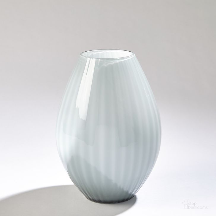 The appearance of Cased Glass Stripe Small Vase In Blue designed by Global Views in the modern / contemporary interior design. This blue piece of furniture  was selected by 1StopBedrooms from Cased Collection to add a touch of cosiness and style into your home. Sku: 3.31609. Material: Glass. Product Type: Vase. Image1