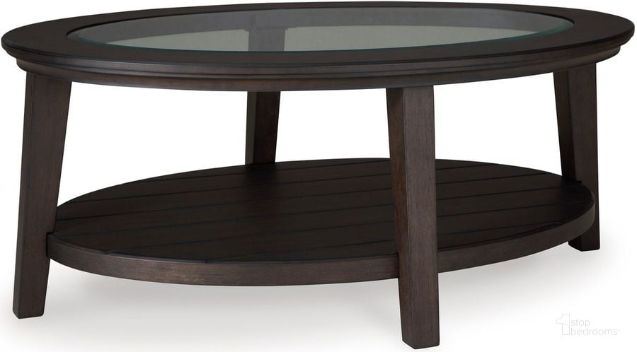 The appearance of Celamar Dark Brown Coffee Table designed by Signature Design by Ashley in the transitional interior design. This dark brown piece of furniture  was selected by 1StopBedrooms from Celamar Collection to add a touch of cosiness and style into your home. Sku: T429-0. Material: Glass. Product Type: Coffee Table. Image1
