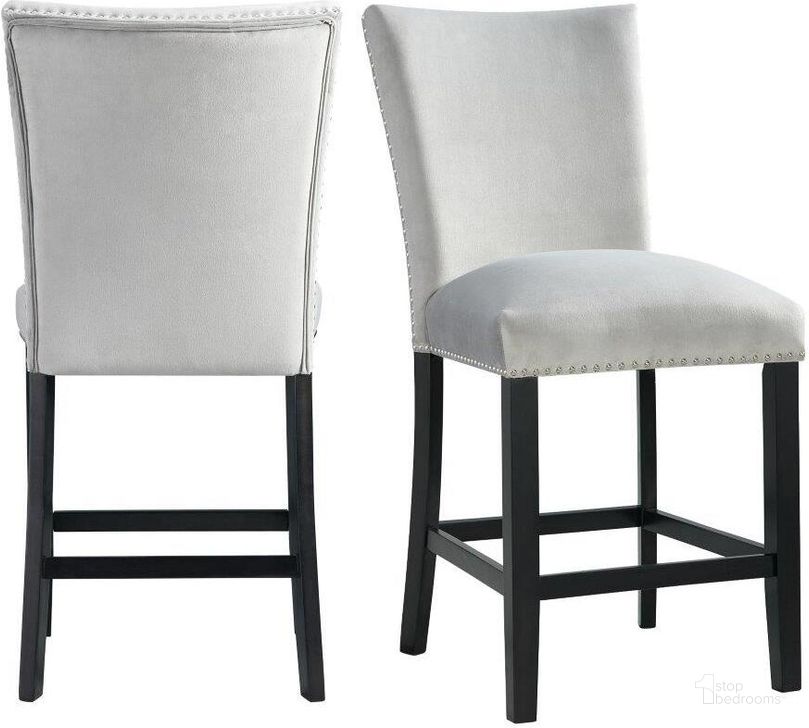 The appearance of Celine Gray Velvet Counter Height Chair Set Of 2 designed by Picket House in the transitional interior design. This gray piece of furniture  was selected by 1StopBedrooms from Celine Collection to add a touch of cosiness and style into your home. Sku: CFC300CVSC. Product Type: Dining Chair. Material: Rubberwood. Image1