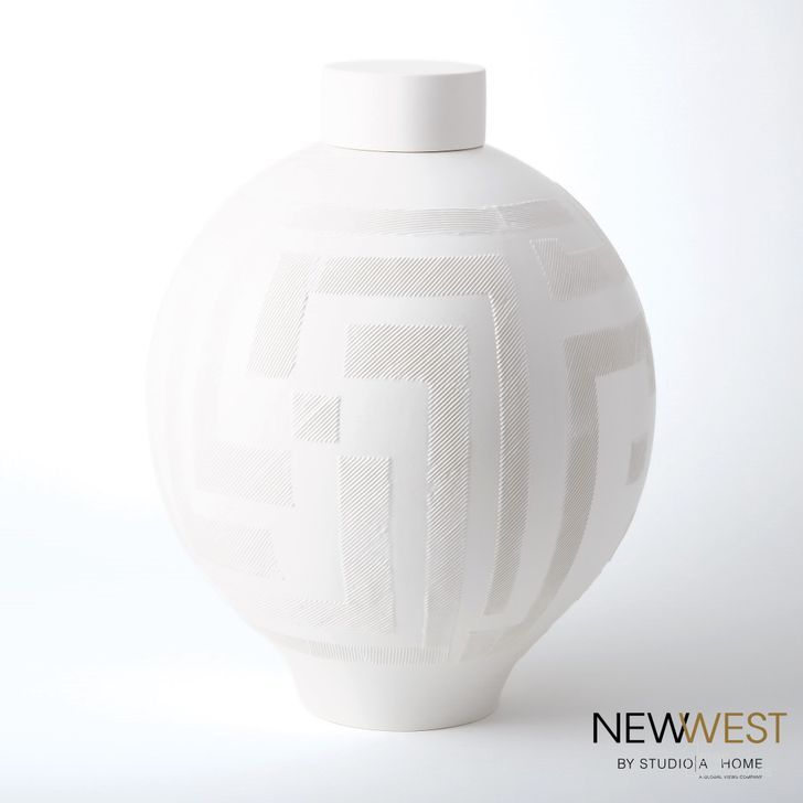 The appearance of Chaco Lidded Jar In Matte White designed by Global Views in the modern / contemporary interior design. This white piece of furniture  was selected by 1StopBedrooms from Chaco Collection to add a touch of cosiness and style into your home. Sku: NW7.10000. Material: Ceramic. Product Type: Jar. Image1