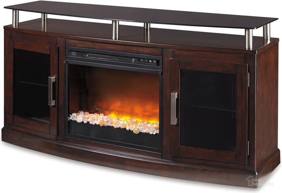 The appearance of Chanceen Dark Brown Medium TV Stand With Glass/Stone Fireplace Insert designed by Signature Design by Ashley in the modern / contemporary interior design. This dark brown piece of furniture  was selected by 1StopBedrooms from Chanceen Collection to add a touch of cosiness and style into your home. Sku: W757-48;W100-02. Material: Glass. Product Type: TV Stand. Image1