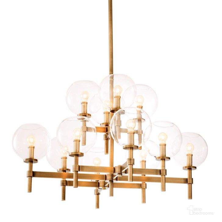 The appearance of Chandelier Jade L Antique Brass Finish designed by Eichholtz in the modern / contemporary interior design. This antique brass piece of furniture  was selected by 1StopBedrooms from Jade Collection to add a touch of cosiness and style into your home. Sku: 112642UL. Material: Glass. Product Type: Chandelier. Image1