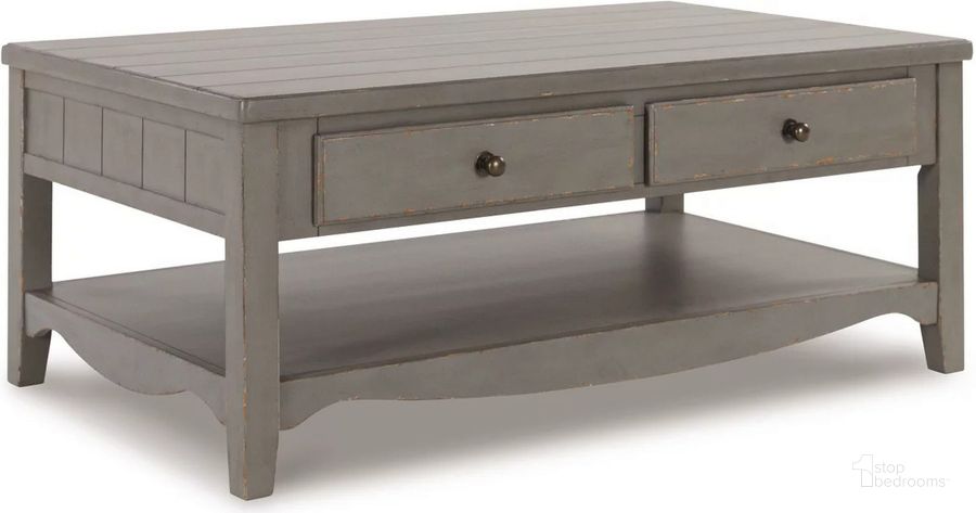 The appearance of Charina Antique Gray Rectangular Cocktail Table designed by Signature Design by Ashley in the traditional interior design. This antique gray piece of furniture  was selected by 1StopBedrooms from Charina Collection to add a touch of cosiness and style into your home. Sku: T784-1. Material: Wood. Product Type: Cocktail Table. Image1