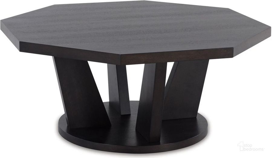 The appearance of Chasinfield Dark Brown Octagon Cocktail Table designed by Signature Design by Ashley in the modern / contemporary interior design. This dark brown piece of furniture  was selected by 1StopBedrooms from Chasinfield Collection to add a touch of cosiness and style into your home. Sku: T458-8. Material: Wood. Product Type: Cocktail Table. Image1