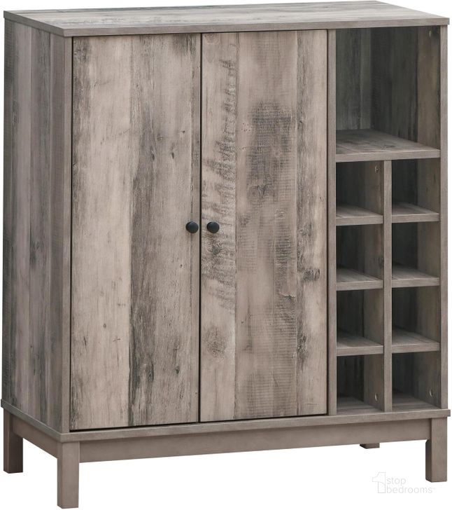 The appearance of Cheyenne 2-Door Wine Cabinet with Stemware Rack In Weathered Acacia designed by Coaster in the rustic / southwestern interior design. This weathered acacia piece of furniture  was selected by 1StopBedrooms from Cheyenne Collection to add a touch of cosiness and style into your home. Sku: 183600. Material: Wood. Product Type: Wine Cabinet. Image1