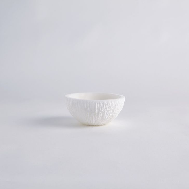 The appearance of Chiseled Alabaster Small Bowl In White designed by Global Views in the modern / contemporary interior design. This white piece of furniture  was selected by 1StopBedrooms from Chiseled Collection to add a touch of cosiness and style into your home. Sku: 7.30147. Product Type: Bowl. Material: Alabaster. Image1