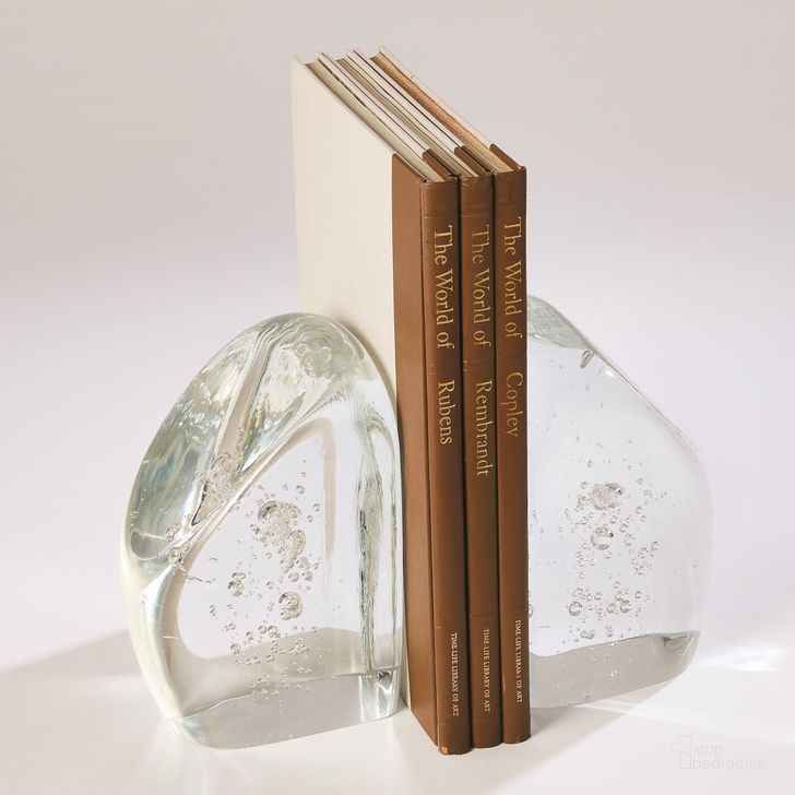 The appearance of Chunk Bookends In Clear With Bubbles designed by Global Views in the modern / contemporary interior design. This clear piece of furniture  was selected by 1StopBedrooms from Chunk Collection to add a touch of cosiness and style into your home. Sku: 6.60429. Material: Glass. Product Type: Bookends. Image1