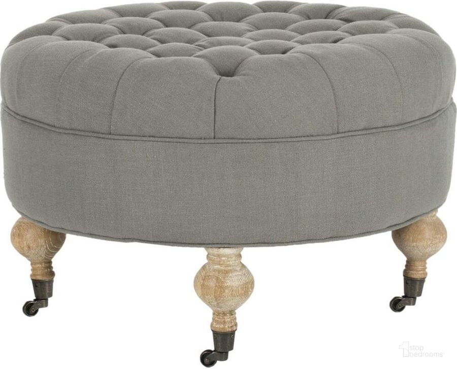 The appearance of Clara Granite and Pickled Oak Tufted Round Ottoman designed by Safavieh in the modern / contemporary interior design. This granite piece of furniture  was selected by 1StopBedrooms from Clara Collection to add a touch of cosiness and style into your home. Sku: MCR4601D. Material: Wood. Product Type: Ottoman. Image1