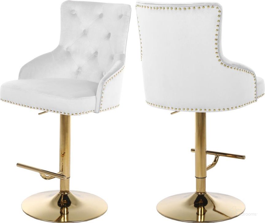 The appearance of Claude White Velvet Adjustable Stool designed by Meridian in the modern / contemporary interior design. This white velvet piece of furniture  was selected by 1StopBedrooms from Claude Collection to add a touch of cosiness and style into your home. Sku: 713White. Product Type: Counter Height Chair. Material: Velvet. Image1