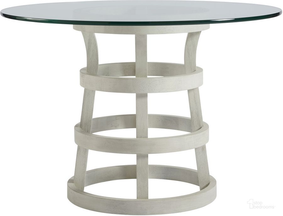 The appearance of Coastal Living Sandbar 44" Round Dining Table designed by Universal in the coastal interior design. This white piece of furniture  was selected by 1StopBedrooms from Coastal Living Collection to add a touch of cosiness and style into your home. Sku: 833656B-TAB;833656-BASE. Table Base Style: Pedestal. Table Top Shape: Round. Material: Glass. Product Type: Dining Table. Image1