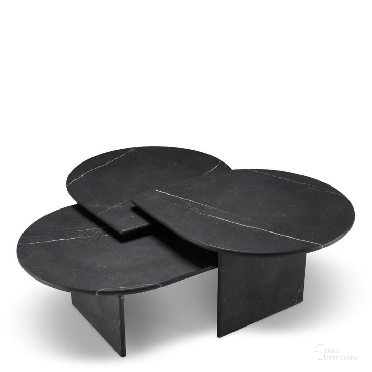 The appearance of Coffee Table Naples Honed Black Marble Set Of 3 designed by Eichholtz in the modern / contemporary interior design. This black piece of furniture  was selected by 1StopBedrooms from Naples Collection to add a touch of cosiness and style into your home. Sku: 114331A;114331B;114331C. Product Type: Coffee Table. Image1