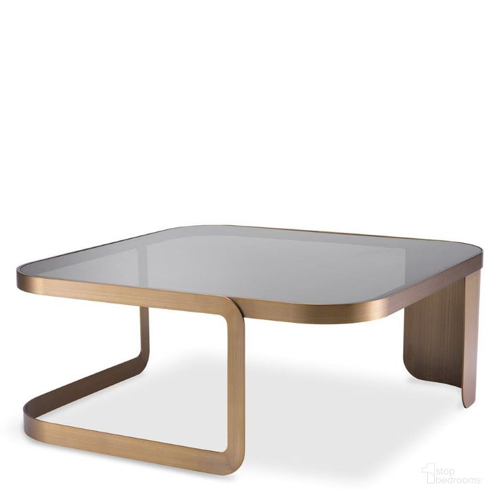 The appearance of Coffee Table Numa Brushed Brass Finish designed by Eichholtz in the modern / contemporary interior design. This brass piece of furniture  was selected by 1StopBedrooms from Numa Collection to add a touch of cosiness and style into your home. Sku: 116296A;116296B. Product Type: Coffee Table. Image1