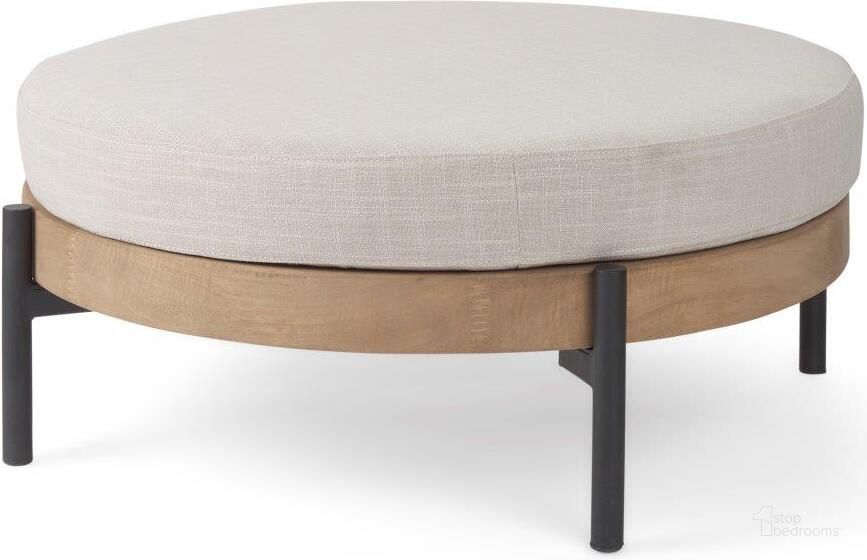 The appearance of Colburne Cream Fabric With Brown Wood Round Ottoman designed by Mercana in the modern / contemporary interior design. This brown and cream piece of furniture  was selected by 1StopBedrooms from Colburne Collection to add a touch of cosiness and style into your home. Sku: 70040. Material: Metal. Product Type: Ottoman. Image1