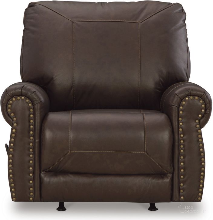The appearance of Colleton Recliner In Dark Brown designed by Signature Design by Ashley in the traditional interior design. This dark brown piece of furniture  was selected by 1StopBedrooms from Colleton Collection to add a touch of cosiness and style into your home. Sku: 5210725. Product Type: Recliner. Material: Leather Match. Image1