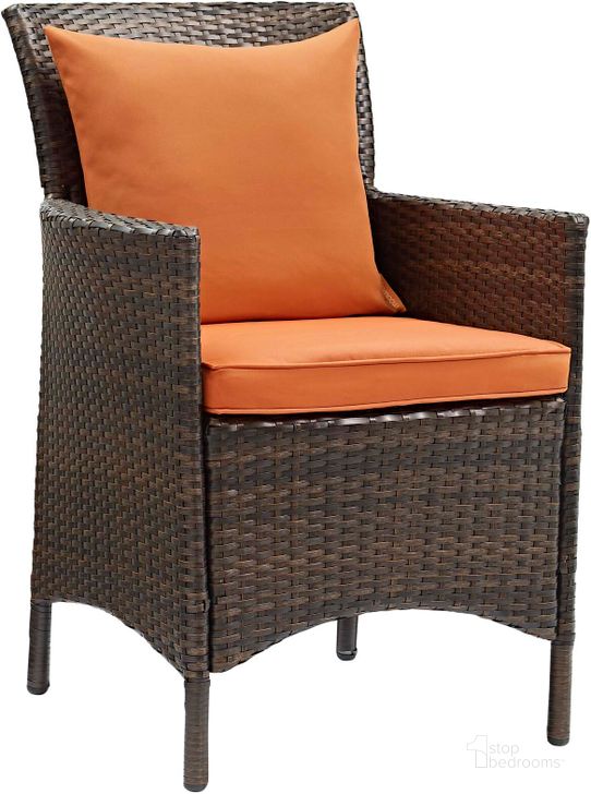 The appearance of Conduit Brown Orange Outdoor Patio Wicker Rattan Dining Arm Chair designed by Modway in the modern / contemporary interior design. This brown orange piece of furniture  was selected by 1StopBedrooms from Conduit Collection to add a touch of cosiness and style into your home. Sku: EEI-2801-BRN-ORA. Material: Rattan. Product Type: Outdoor Dining Chair. Image1