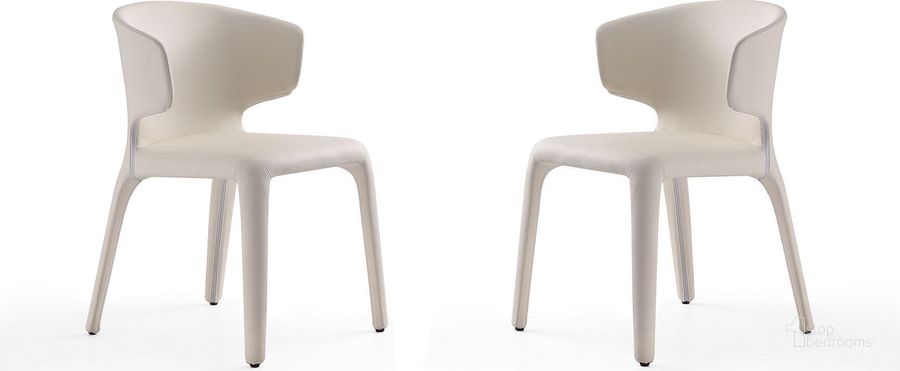 The appearance of Conrad Leather Dining Chair in Cream (Set of 2) designed by Manhattan Comfort in the transitional interior design. This cream piece of furniture  was selected by 1StopBedrooms from Conrad Collection to add a touch of cosiness and style into your home. Sku: DC031-CR. Material: Metal. Product Type: Dining Chair. Image1