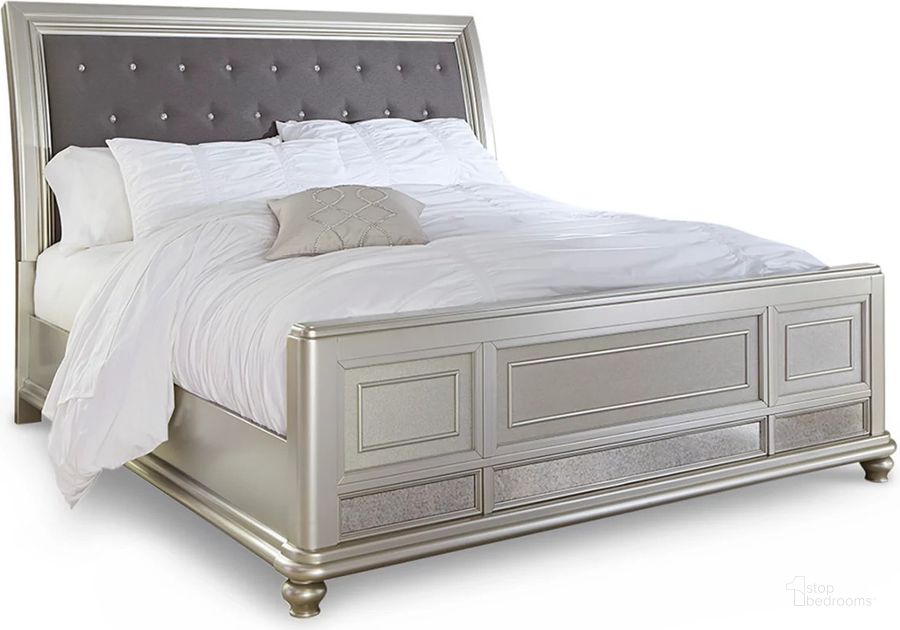 The appearance of Coralayne California King Sleigh Bed In Silver designed by Signature Design by Ashley in the traditional interior design. This silver piece of furniture  was selected by 1StopBedrooms from Coralayne Collection to add a touch of cosiness and style into your home. Sku: B650-56;B650-58;B650-94. Bed Type: Sleigh Bed. Material: Wood. Product Type: Sleigh Bed. Bed Size: California King. Image1