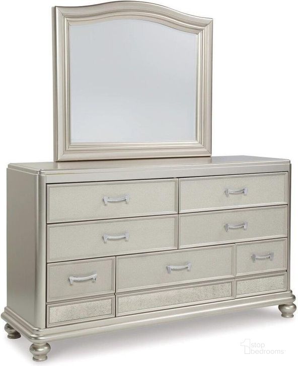 The appearance of Coralayne Dresser and Mirror In Silver designed by Signature Design by Ashley in the traditional interior design. This silver piece of furniture  was selected by 1StopBedrooms from Coralayne Collection to add a touch of cosiness and style into your home. Sku: B650-136;B650-31. Material: Glass. Product Type: Dresser and Mirror. Image1