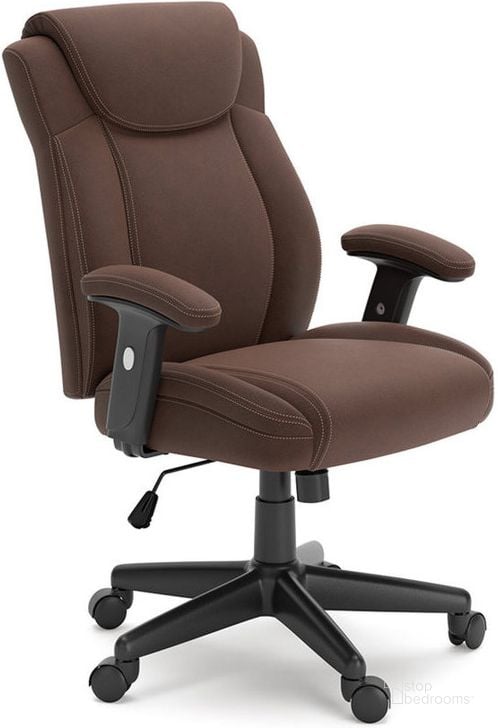 The appearance of Corbindale Brown/Black Home Office Swivel Desk Chair designed by Signature Design by Ashley in the transitional interior design. This brown/black piece of furniture  was selected by 1StopBedrooms from Corbindale Collection to add a touch of cosiness and style into your home. Sku: H220-05A. Product Type: Office Chair. Material: Leather Match. Image1